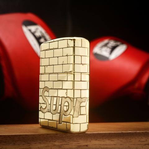 Bật lửa Zippo khắc bức tường Supreme bản armor đồng bóng