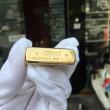 Zippo đồng bóng khắc hoa văn