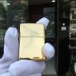 Zippo đồng bóng khắc hoa văn