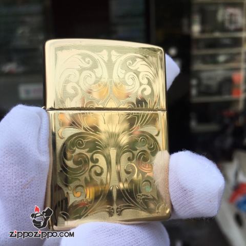 Zippo đồng bóng khắc hoa văn