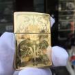 Zippo đồng bóng khắc hoa văn
